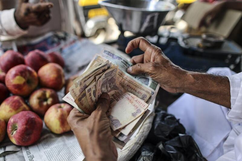 The Indian rupee fell to a series of historic lows over the summer. Dhiraj Singh / Bloomberg