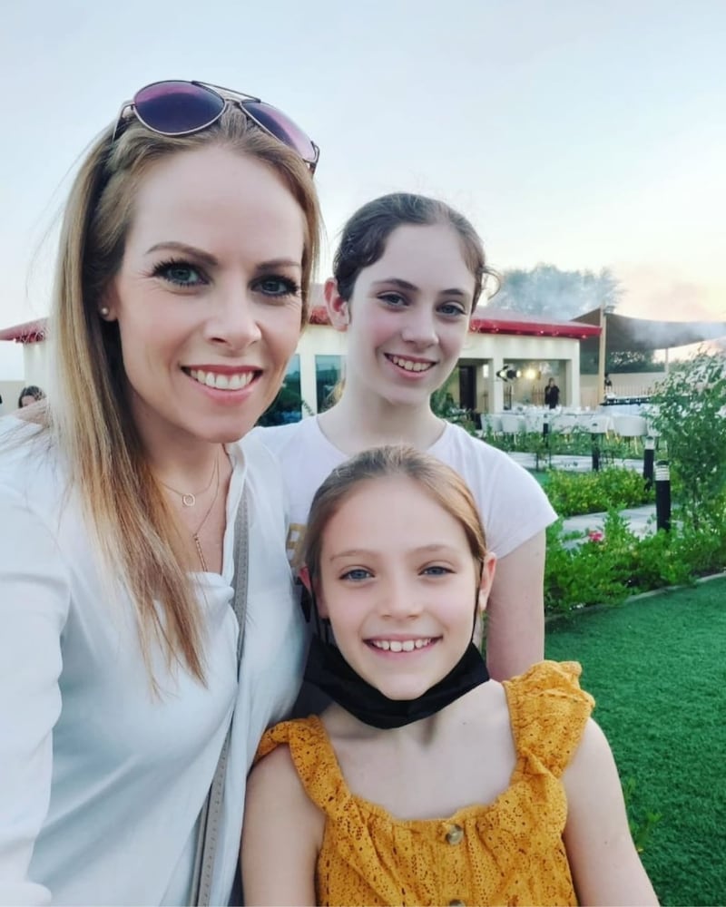 A family picture of Liz Glanville with her daughters Anais, at front, and Savannah, who is recovering in hospital from multisystem inflammatory syndrome.