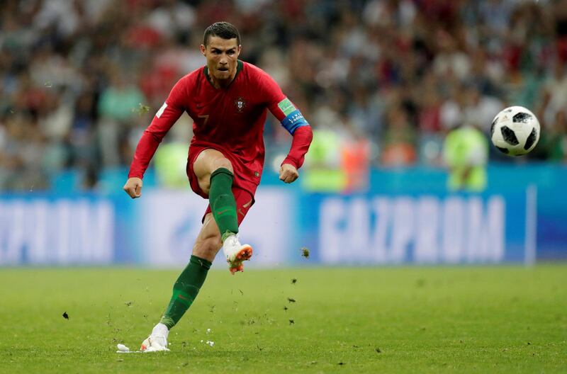 Portugal's Critsiano Ronaldo sends the ball flying towards the top corner from his free kick. Ueslei Marcelino / Reuters