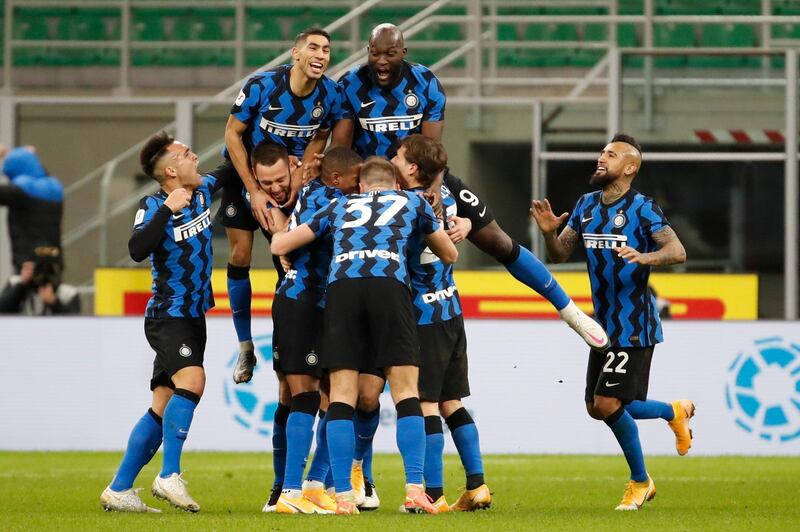 Inter Milan players celebrate Christian Eriksen's winner. PA