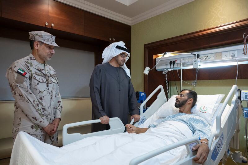 President Sheikh Mohamed visits Capt Mohamed Al Nuaimi, who was injured while serving with the UAE Armed Forces in Somalia, at Zayed Military Hospital. All photos: Abdulla Al Neyadi / UAE Presidential Court 