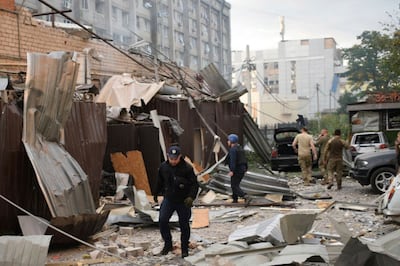 Ukrainian police at the scene of the Russian missile attack. AP