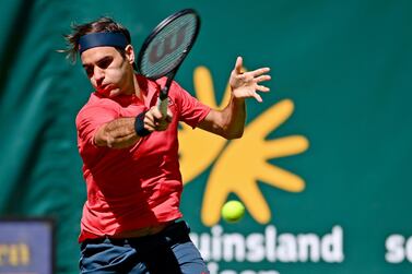 HALLE, GERMANY - JUNE 14: Roger Federer of Switzerland plays a forehand in his match against Ilya Ivashka of Belarus during day 3 of the Noventi Open at OWL-Arena on June 14, 2021 in Halle, Germany. (Photo by Thomas F. Starke/Getty Images)