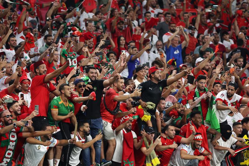 Morocco fans celebrate after the 2-0 win. Getty