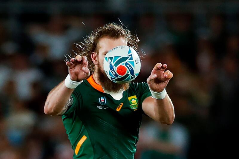 South Africa lock RG Snyman reaches for the ball during the Rugby World Cup final. AFP