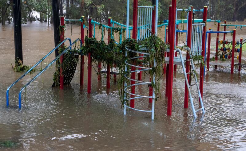 Debris rests on playground equipment as water levels subside on the banks of the Nepean River at Jamisontown on the western outskirts of Sydney. AP Photo