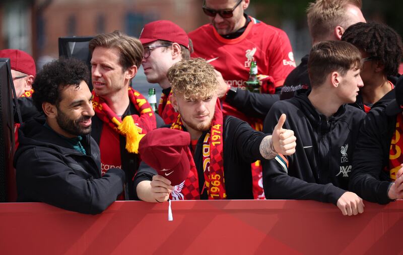 Liverpool's Harvey Elliott and Mohamed Salah during the trophy parade. Reuters