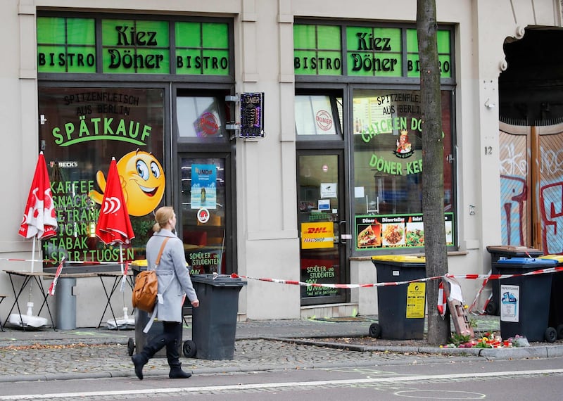 A pedestrian passes the doner kebab restaurant that was targeted by during the attack in Halle, east German. AFP