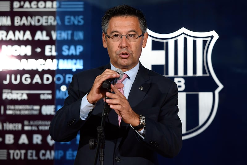 Barcelona's president Josep Maria Bartomeu speaks during the official presentation of Barcelona's new Brazilian football player Paulinho Bezerra, after signing his new contract with the Catalan club at the Camp Nou stadium in Barcelona on August 17, 2017. / AFP PHOTO / LLUIS GENE