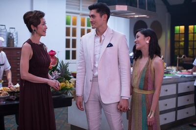 Michelle Yeoh as Eleanor Young, Henry Golding as Nick Young and Constance Wu as Rachel Chu in Crazy Rich Asians. Sanja Bucko / Warner Bros. Pictures