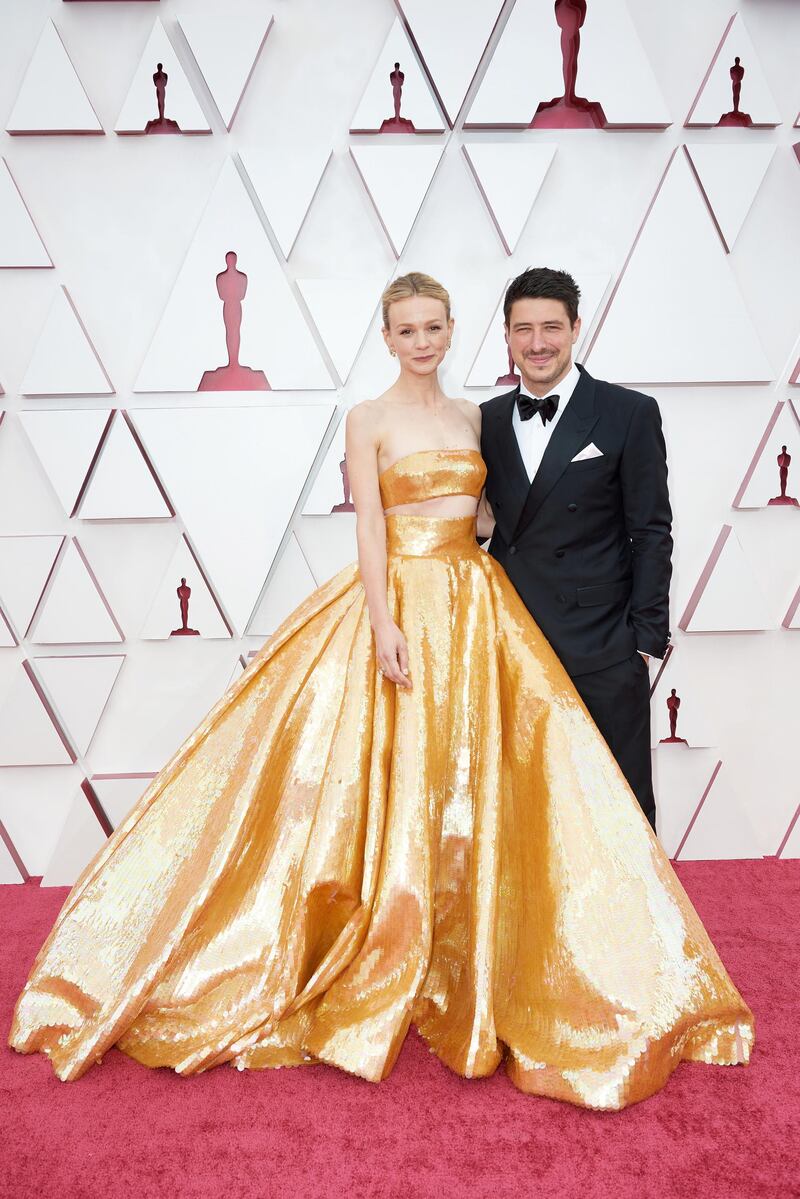 Carey Mulligan and Marcus Mumford arrive at the 93rd Academy Awards at Union Station in Los Angeles, California, on April 25, 2021. EPA