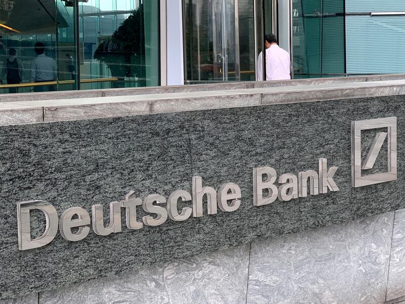 FILE PHOTO: The logo of Deutsche bank is seen in Hong Kong, China July 8, 2019. REUTERS/Tyrone Siu/File Photo