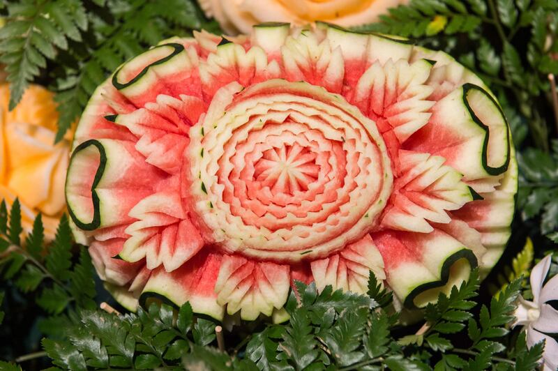 A carved watermelon is displayed during a fruit and vegetable carving competition in Bangkok. Robert Schmidt / AFP