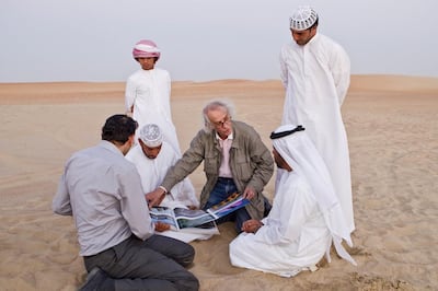 Christo Javacheff, centre, meets with Liwa residents to discuss his plans to construct The Mastaba, a pyramid of 410,000 barrels. Antonie Robertson / The National
