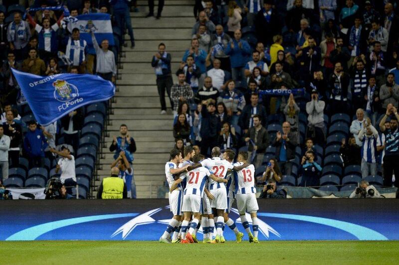 FC Porto players celebrate Otavio’s goal against FC Copenhagen. The match ended 1-1. Fernando Veludo / EPA