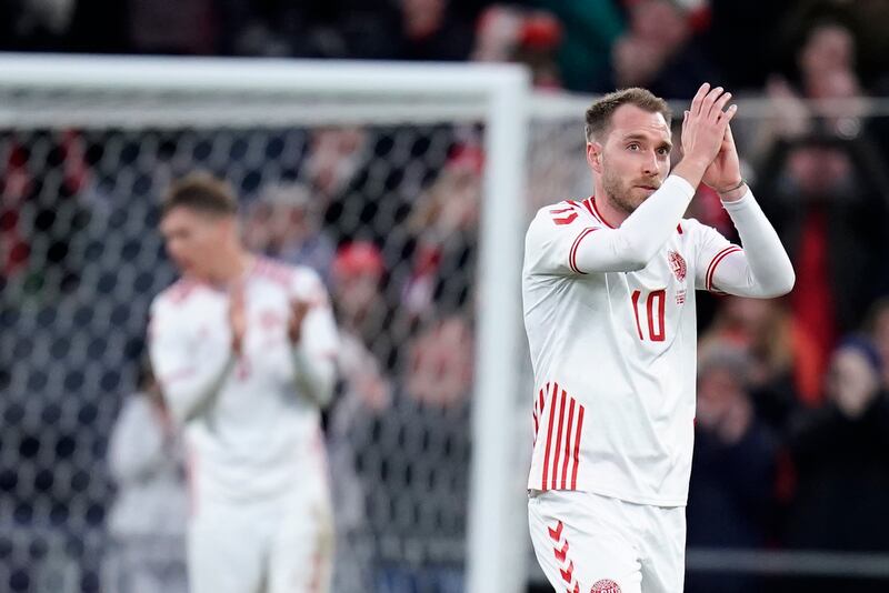 Christian Eriksen greets the fans as he leaves the pitch. EPA