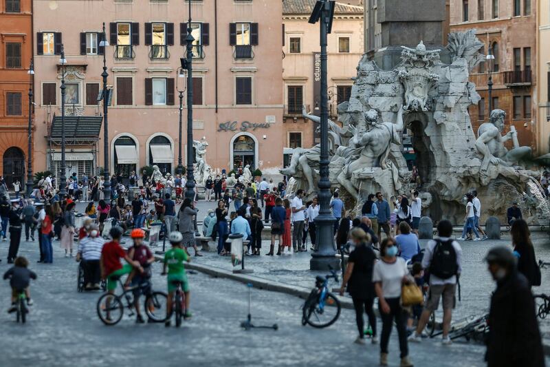 People gather in the Piazza Navona in Rome. AP