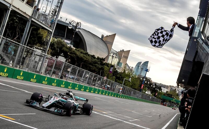 Formula One - F1 - Azerbaijan Grand Prix - Baku City Circuit, Baku, Azerbaijan - April 29, 2018   Mercedes' Lewis Hamilton crosses the finish line to win the race   Srdjan Suki/Pool via Reuters     TPX IMAGES OF THE DAY