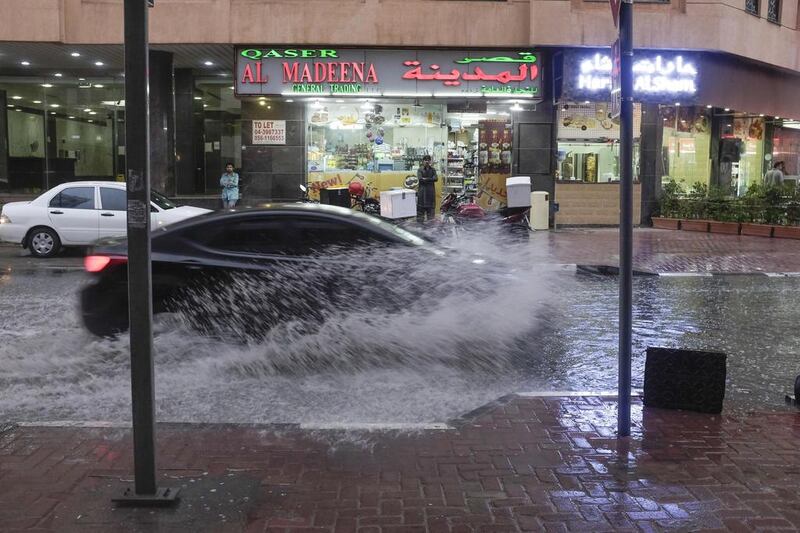 A flooded street in Dubai last month where strong wind caused a crane to collapse. Antonie Robertson /The National