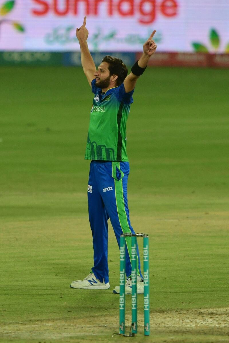 Multan Sultans' Shahid Afridi celebrates the wicket of Lahore Qalandars' Ben Dunk. AFP