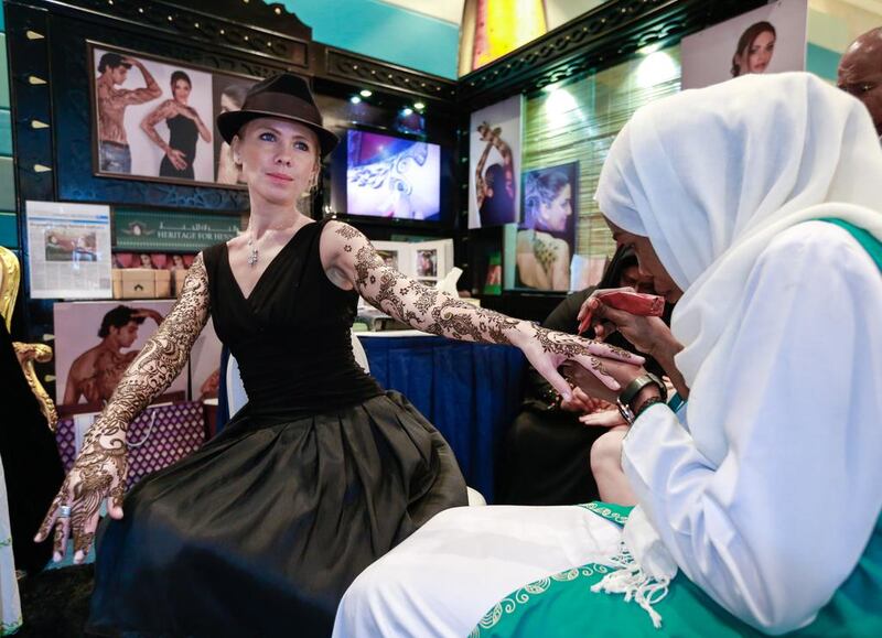 A Heritage for Henna model shows off her Henna art in Dubai.  Victor Besa for The National.