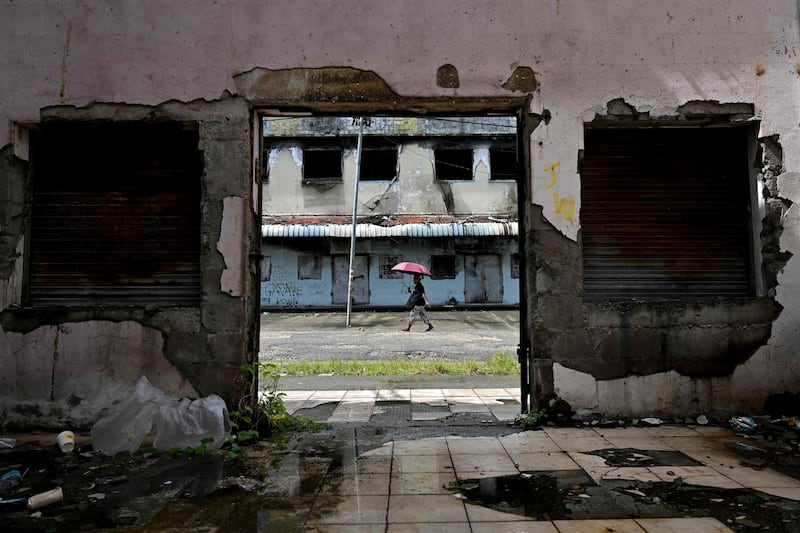 A derelict building in the Chinatown district of Honiara, capital of the Solomon Islands. Residents fear violence in the district  if the nation re-elects a pro-Beijing leader. AFP