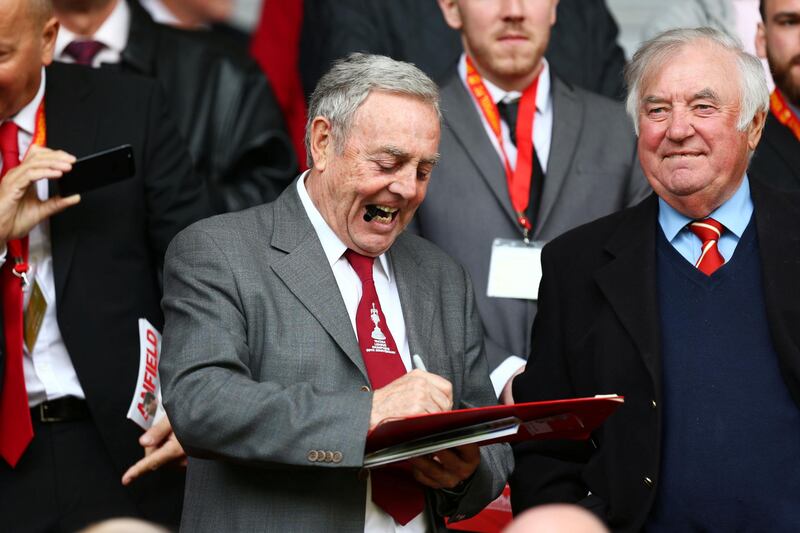 Ian St John with British comedian Jimmy Tarbuck at a Liverpool v Tottenham game at Anfield in 2014. Reuters