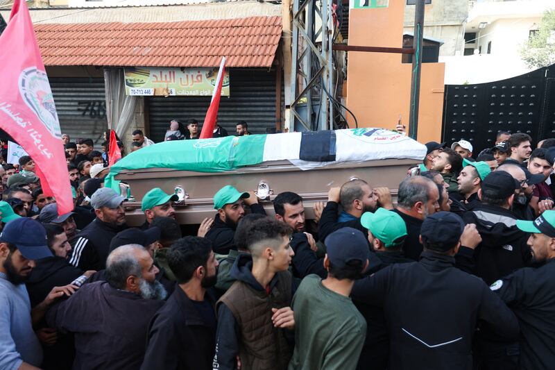 Mourners gather during the funeral of Ahmad Hammoud, who was killed with Hamas deputy leader Saleh Al Arouri in an Israeli drone strike in Beirut. Reuters