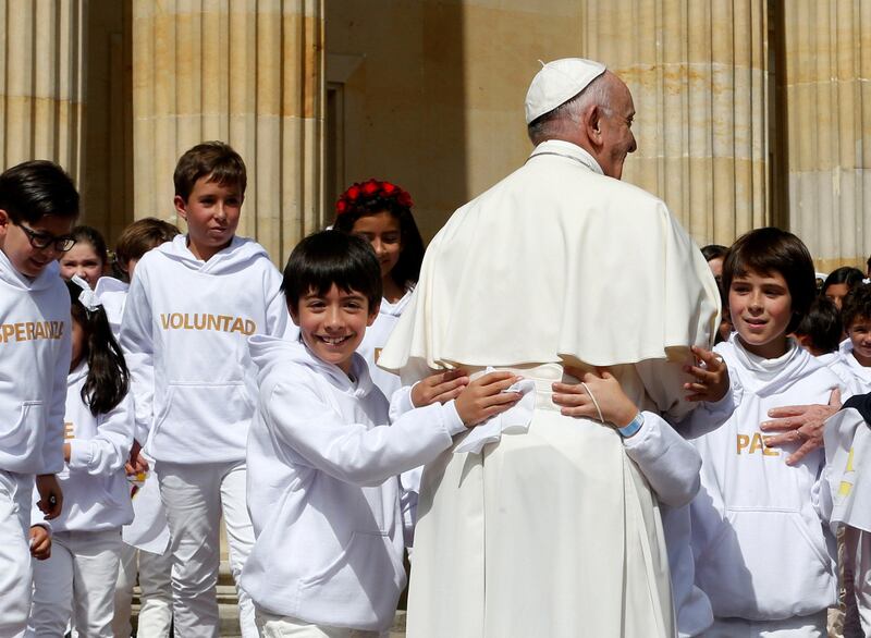 Pope Francis is greeted by children during a meeting at Narino presidential palace in Bogota, Colombia September 7, 2017. REUTERS/Stefano Rellandini - RC1CF2827AF0