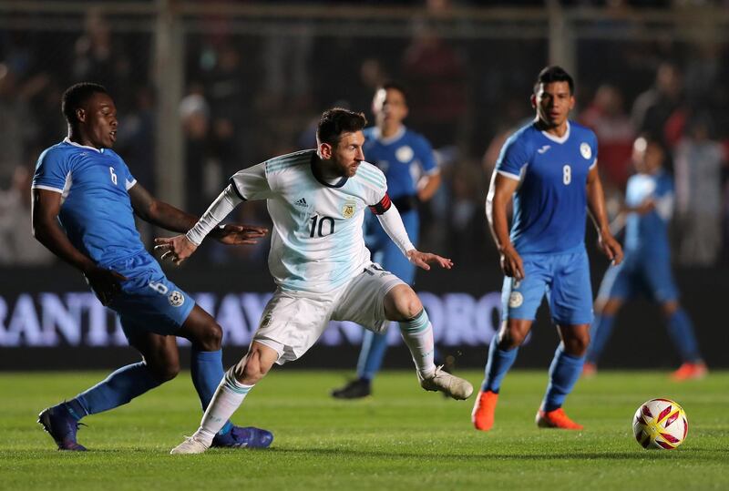 Argentina's Lionel Messi, left, in action against Nicaragua in San Juan, Argentina, on Friday. AP Photo/Nicolas Aguilera / AP Photo