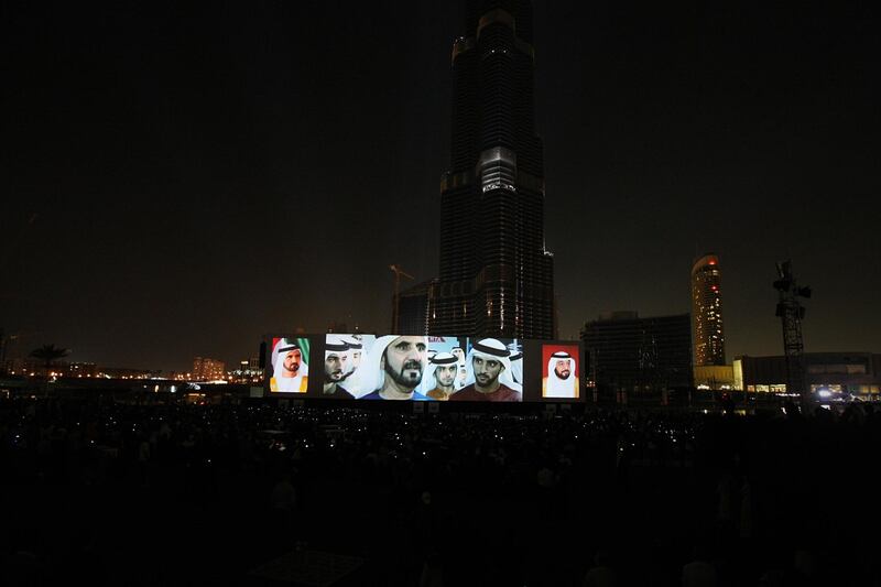 United Arab Emirates- Dubai - January 4, 2010:

NATIONAL: Sheikh Mohammed bin Rashid's image is displayed on a big screen during the grand opening of the Burj Khalifa in Dubai on Monday, January 4, 2010. Amy Leang/The National 
EDITORS NOTE: Building was opened at 8pm on January 4th, 2010 at which point the name changed from Burj Dubai to Burj Khalifa. Official name is now Burj Khalifa *** Local Caption ***  amy_010410_burj_30.jpg