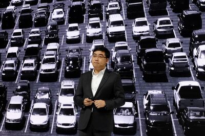 FILE PHOTO: Didi Chuxing's CEO Cheng Wei speaks at a product launch event in Beijing, China November 16, 2020.  REUTERS/Yilei Sun/File Photo