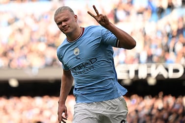 Manchester City's Norwegian striker Erling Haaland celebrates scoring the team's second goal from the penalty spot during the English Premier League football match between Manchester City and Brighton and Hove Albion at the Etihad Stadium in Manchester, north west England, on October 22, 2022.  (Photo by Oli SCARFF / AFP) / RESTRICTED TO EDITORIAL USE.  No use with unauthorized audio, video, data, fixture lists, club/league logos or 'live' services.  Online in-match use limited to 120 images.  An additional 40 images may be used in extra time.  No video emulation.  Social media in-match use limited to 120 images.  An additional 40 images may be used in extra time.  No use in betting publications, games or single club/league/player publications.   /  
