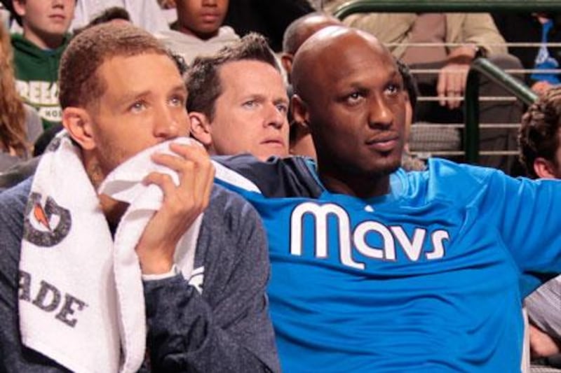 The Dallas Mavericks gave up on Lamar Odom, right, after team owner Mark Cuban had a heated exchange with the player during a halftime in one of their games.