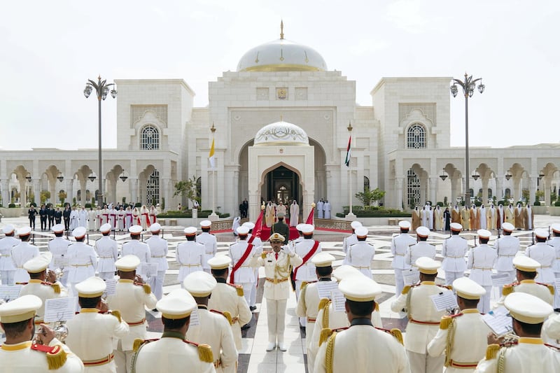 ABU DHABI, UNITED ARAB EMIRATES - February 04, 2019: Day two of the UAE papal visit - (center R L) HH Sheikh Mohamed bin Zayed Al Nahyan, Crown Prince of Abu Dhabi and Deputy Supreme Commander of the UAE Armed Forces, His Holiness Pope Francis, Head of the Catholic Church and HH Sheikh Mohamed bin Rashid Al Maktoum, Vice-President, Prime Minister of the UAE, Ruler of Dubai and Minister of Defence, stand for a national anthem during a reception, at the Presidential Palace.

( Rashed Al Mansoori / Ministry of Presidential Affairs )
---