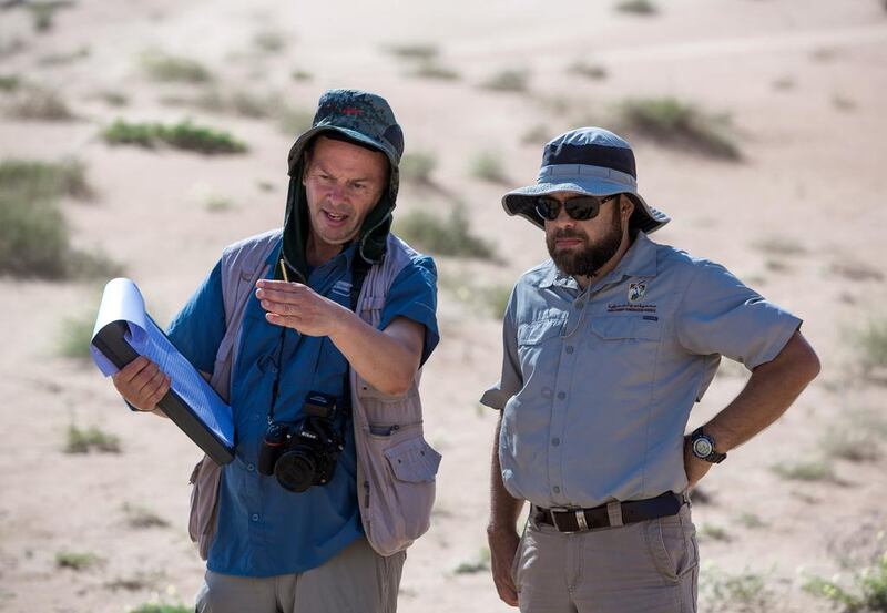 Dr Gary Brown, a freelance ecologist and Tamer Ali Khafaga, the conservation officer, survey a part of the Dubai Desert Conservation Reserve.