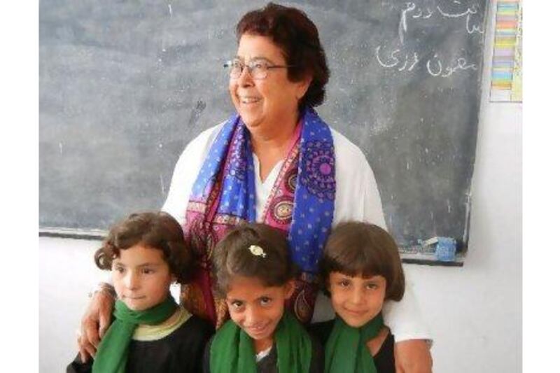 Afghan schoolgirls' faces speak eloquently of what the country needs, a reader says. Courtesy: Ray of Hope Foundation