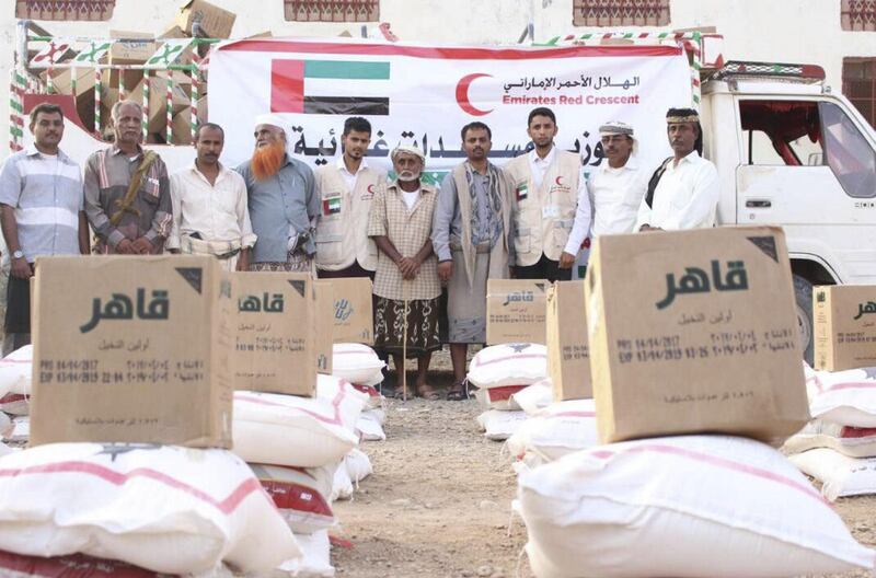 Emirates Red Crescent distributes emergency food aid in the Shabwa Governorate of Yemen on Monday. Wam