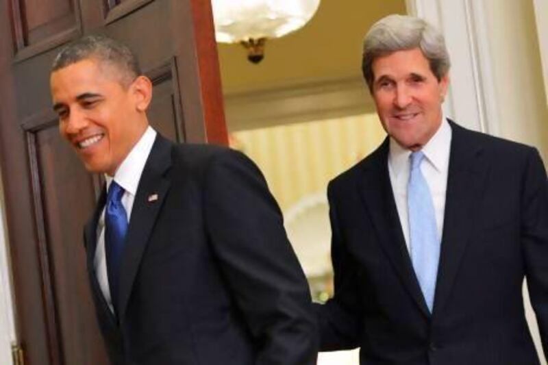 US President Barack Obama and Senator John Kerry enter the Roosevelt Room of the White House last year. Mr Kerry has been nominated to be the next secretary of state. Mandel Ngan / AFP