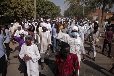 People protest in Khartoum, Sudan, after the military takeover on Monday. AP