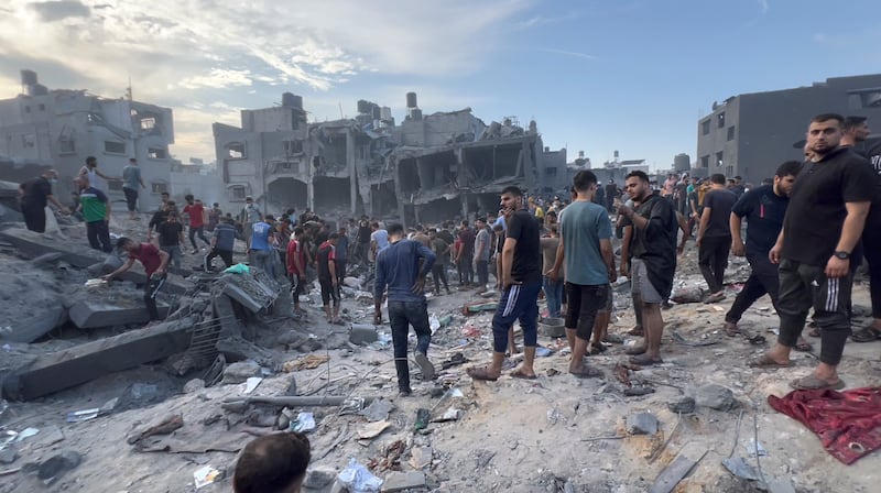 Palestinians search for survivors and bodies following Israeli airstrikes at the Jabalia, the largest refugee camp in Gaza. AP