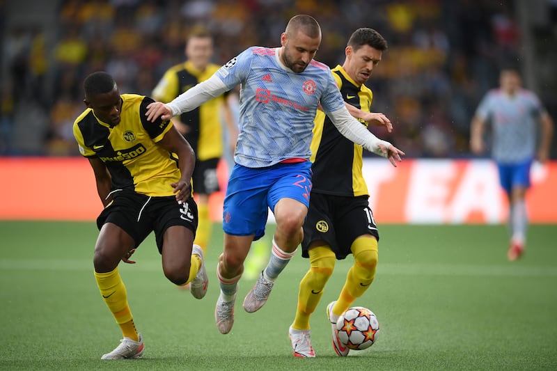 United left-back Luke Shaw under pressure from Christopher Martins Pereira and Christian Fassnacht of Young Boys. Getty