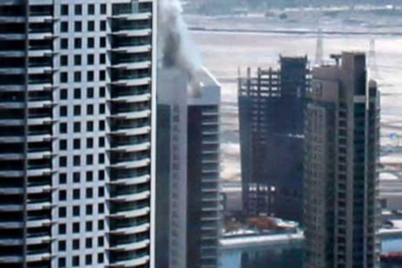Dubai Police said that a forensic investigation team was examining the scene but it was too early to know for sure what had started the blaze. Vivian Nereim / The National