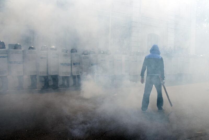 Ukrainian riot policemen fight with “ rioters” as they take part in exercises for mass disturbances suppression in the southern Ukrainian city of Odessa. Alexey Kravtsov / AFP 