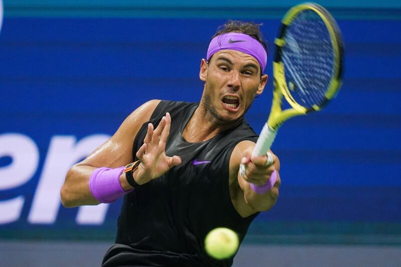 Rafael Nadal of Spain returns the ball against Marin Cilic of Croatia in their Round Four Men's Singles tennis match during the 2019 US Open at the USTA Billie Jean King National Tennis Center in New York.  AFP