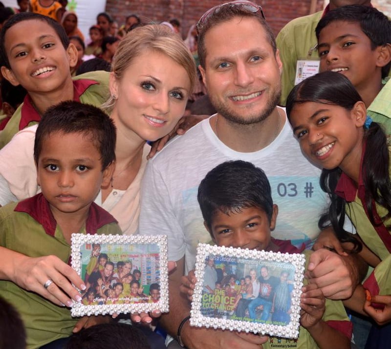 Eva Kernova and Mohammed Loch with some of the Bangladesh children at the school they have set up. Courtesy Eva Kernova