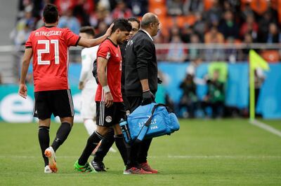 Egypt's Tarek Hamed leaves the field during the group A match between Egypt and Uruguay at the 2018 soccer World Cup in the Yekaterinburg Arena in Yekaterinburg, Russia, Friday, June 15, 2018. (AP Photo/Mark Baker)