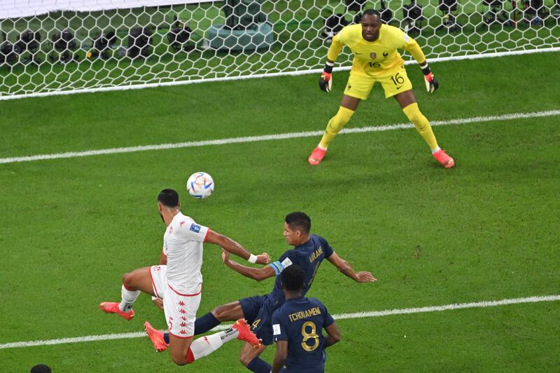 Tunisia's Nader Ghandri flicks the ball into the France net but the goal was disallowed for offside. AFP