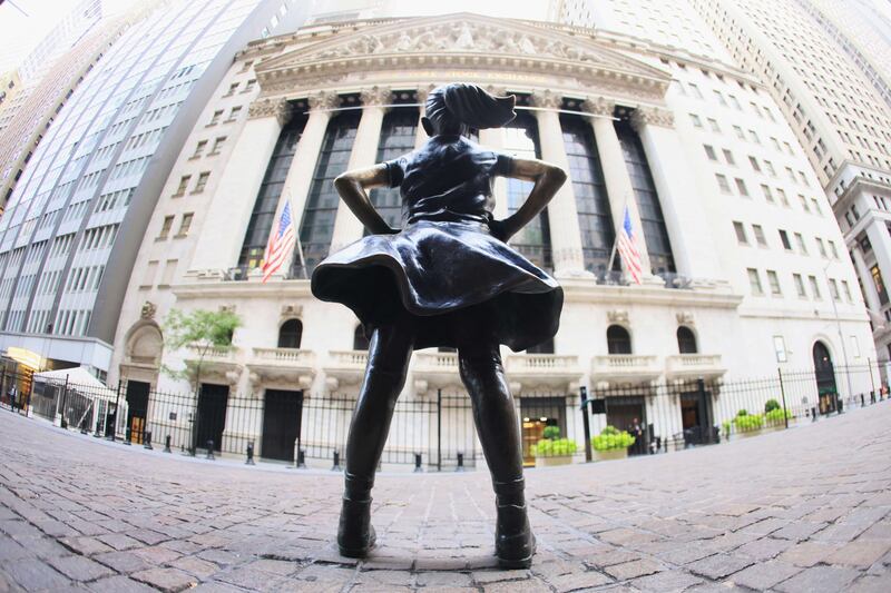 The sculpture Fearless Girl is seen in front of the New York Stock Exchange building. AFP