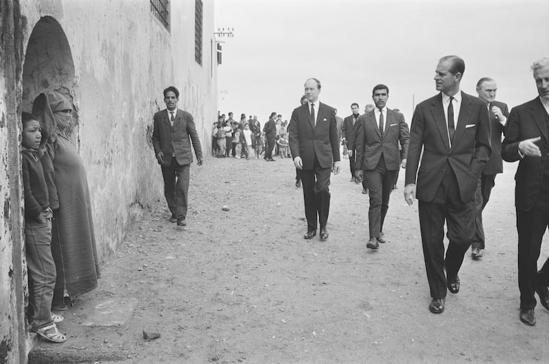 Prince Philip, Duke of Edinburgh is taken to meet local residents on a visit to Morocco, 20th December 1964. (Photo by Stan Meagher/Daily Express/Hulton Archive/Getty Images)